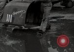 Image of USAAC mechanics perform maintenance on P-40 and P-400 airplanes Guadalcanal Solomon Islands, 1943, second 41 stock footage video 65675074690
