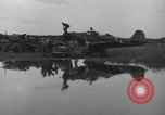 Image of USAAC mechanics perform maintenance on P-40 and P-400 airplanes Guadalcanal Solomon Islands, 1943, second 45 stock footage video 65675074690