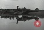 Image of USAAC mechanics perform maintenance on P-40 and P-400 airplanes Guadalcanal Solomon Islands, 1943, second 47 stock footage video 65675074690
