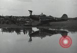 Image of USAAC mechanics perform maintenance on P-40 and P-400 airplanes Guadalcanal Solomon Islands, 1943, second 48 stock footage video 65675074690