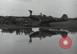 Image of USAAC mechanics perform maintenance on P-40 and P-400 airplanes Guadalcanal Solomon Islands, 1943, second 49 stock footage video 65675074690