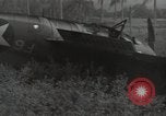 Image wrecked F4F Wildcat fighter Guadalcanal Îles Salomon, 1943, de la seconde 9 séquences d'archives historiques vidéo 65675074693