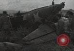 Image wrecked F4F Wildcat fighter Guadalcanal Îles Salomon, 1943, de la seconde 10 séquences d'archives historiques vidéo 65675074693