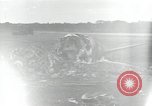 Image of Wrecked P-38 Lightening aircraft Guadalcanal Solomon Islands, 1943, second 1 stock footage video 65675074697