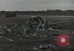 Image of Wrecked P-38 Lightening aircraft Guadalcanal Solomon Islands, 1943, second 3 stock footage video 65675074697
