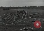 Image of Wrecked P-38 Lightening aircraft Guadalcanal Solomon Islands, 1943, second 4 stock footage video 65675074697