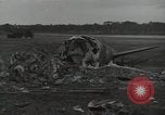 Image of Wrecked P-38 Lightening aircraft Guadalcanal Solomon Islands, 1943, second 5 stock footage video 65675074697