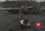 Image of Wrecked P-38 Lightening aircraft Guadalcanal Solomon Islands, 1943, second 29 stock footage video 65675074697
