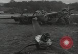 Image of Wrecked P-38 Lightening aircraft Guadalcanal Solomon Islands, 1943, second 33 stock footage video 65675074697