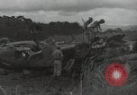 Image of Wrecked P-38 Lightening aircraft Guadalcanal Solomon Islands, 1943, second 36 stock footage video 65675074697