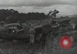Image of Wrecked P-38 Lightening aircraft Guadalcanal Solomon Islands, 1943, second 40 stock footage video 65675074697