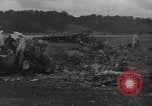 Image of Wrecked P-38 Lightening aircraft Guadalcanal Solomon Islands, 1943, second 44 stock footage video 65675074697