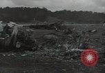 Image of Wrecked P-38 Lightening aircraft Guadalcanal Solomon Islands, 1943, second 45 stock footage video 65675074697