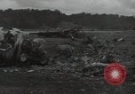 Image of Wrecked P-38 Lightening aircraft Guadalcanal Solomon Islands, 1943, second 46 stock footage video 65675074697