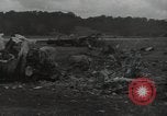 Image of Wrecked P-38 Lightening aircraft Guadalcanal Solomon Islands, 1943, second 47 stock footage video 65675074697