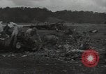 Image of Wrecked P-38 Lightening aircraft Guadalcanal Solomon Islands, 1943, second 50 stock footage video 65675074697