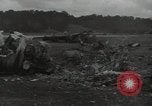 Image of Wrecked P-38 Lightening aircraft Guadalcanal Solomon Islands, 1943, second 51 stock footage video 65675074697