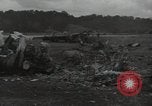 Image of Wrecked P-38 Lightening aircraft Guadalcanal Solomon Islands, 1943, second 52 stock footage video 65675074697