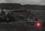 Image of Wrecked P-38 Lightening aircraft Guadalcanal Solomon Islands, 1943, second 53 stock footage video 65675074697