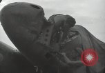 Image of Wrecked P-38 Lightening aircraft Guadalcanal Solomon Islands, 1943, second 60 stock footage video 65675074697