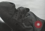 Image of Wrecked P-38 Lightening aircraft Guadalcanal Solomon Islands, 1943, second 61 stock footage video 65675074697