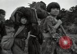 Image of Okinawan civilians Okinawa Ryukyu Islands, 1945, second 60 stock footage video 65675074701