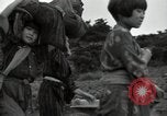 Image of Okinawan civilians Okinawa Ryukyu Islands, 1945, second 61 stock footage video 65675074701
