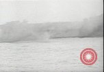 Image of USS Hancock CV-19 burning from kamikaze strike Pacific Ocean, 1945, second 16 stock footage video 65675074716