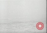 Image of USS Hancock CV-19 burning from kamikaze strike Pacific Ocean, 1945, second 19 stock footage video 65675074716