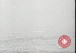 Image of USS Hancock CV-19 burning from kamikaze strike Pacific Ocean, 1945, second 21 stock footage video 65675074716