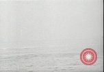 Image of USS Hancock CV-19 burning from kamikaze strike Pacific Ocean, 1945, second 22 stock footage video 65675074716