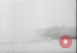 Image of USS Hancock CV-19 burning from kamikaze strike Pacific Ocean, 1945, second 23 stock footage video 65675074716