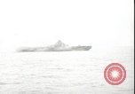Image of USS Hancock CV-19 burning from kamikaze strike Pacific Ocean, 1945, second 26 stock footage video 65675074716