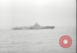 Image of USS Hancock CV-19 burning from kamikaze strike Pacific Ocean, 1945, second 27 stock footage video 65675074716