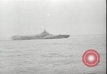 Image of USS Hancock CV-19 burning from kamikaze strike Pacific Ocean, 1945, second 33 stock footage video 65675074716