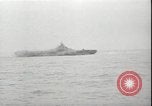 Image of USS Hancock CV-19 burning from kamikaze strike Pacific Ocean, 1945, second 35 stock footage video 65675074716