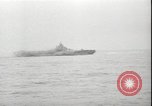 Image of USS Hancock CV-19 burning from kamikaze strike Pacific Ocean, 1945, second 36 stock footage video 65675074716