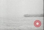 Image of USS Hancock CV-19 burning from kamikaze strike Pacific Ocean, 1945, second 43 stock footage video 65675074716