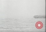 Image of USS Hancock CV-19 burning from kamikaze strike Pacific Ocean, 1945, second 44 stock footage video 65675074716