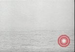 Image of USS Hancock CV-19 burning from kamikaze strike Pacific Ocean, 1945, second 45 stock footage video 65675074716
