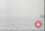 Image of USS Hancock CV-19 burning from kamikaze strike Pacific Ocean, 1945, second 46 stock footage video 65675074716