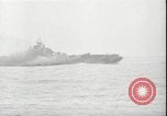 Image of USS Hancock CV-19 burning from kamikaze strike Pacific Ocean, 1945, second 49 stock footage video 65675074716
