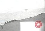 Image of USS Hancock CV-19 burning from kamikaze strike Pacific Ocean, 1945, second 53 stock footage video 65675074716