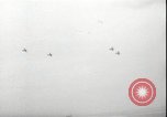 Image of USS Hancock CV-19 burning from kamikaze strike Pacific Ocean, 1945, second 55 stock footage video 65675074716