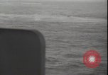 Image of USS Hancock CV-19 burning from kamikaze strike Pacific Ocean, 1945, second 59 stock footage video 65675074716