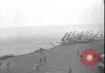 Image of planes on deck Pacific Ocean, 1945, second 1 stock footage video 65675074717