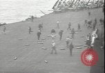 Image of planes on deck Pacific Ocean, 1945, second 5 stock footage video 65675074717