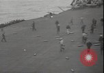 Image of planes on deck Pacific Ocean, 1945, second 6 stock footage video 65675074717