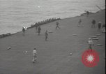 Image of planes on deck Pacific Ocean, 1945, second 7 stock footage video 65675074717