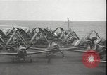 Image of planes on deck Pacific Ocean, 1945, second 12 stock footage video 65675074717